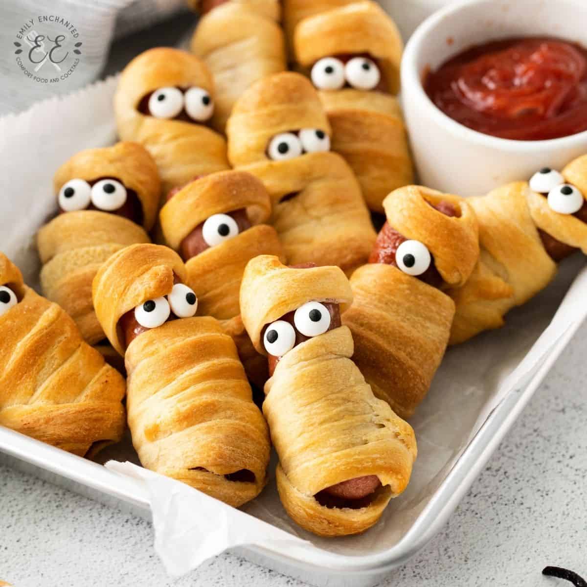 Mummy Pigs in a Blanket with Golden Crescent Roll Wraps