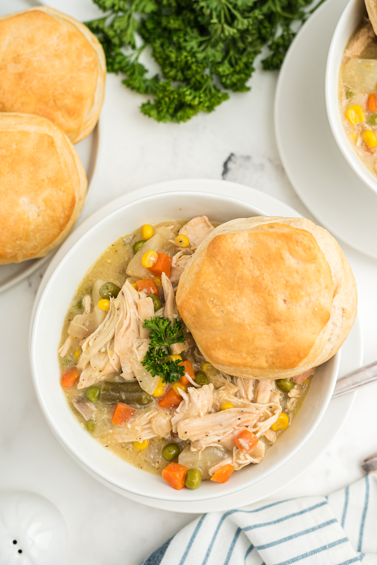 Crock Pot Chicken Pot Pie With Creamy Vegetables and Buttery Biscuits