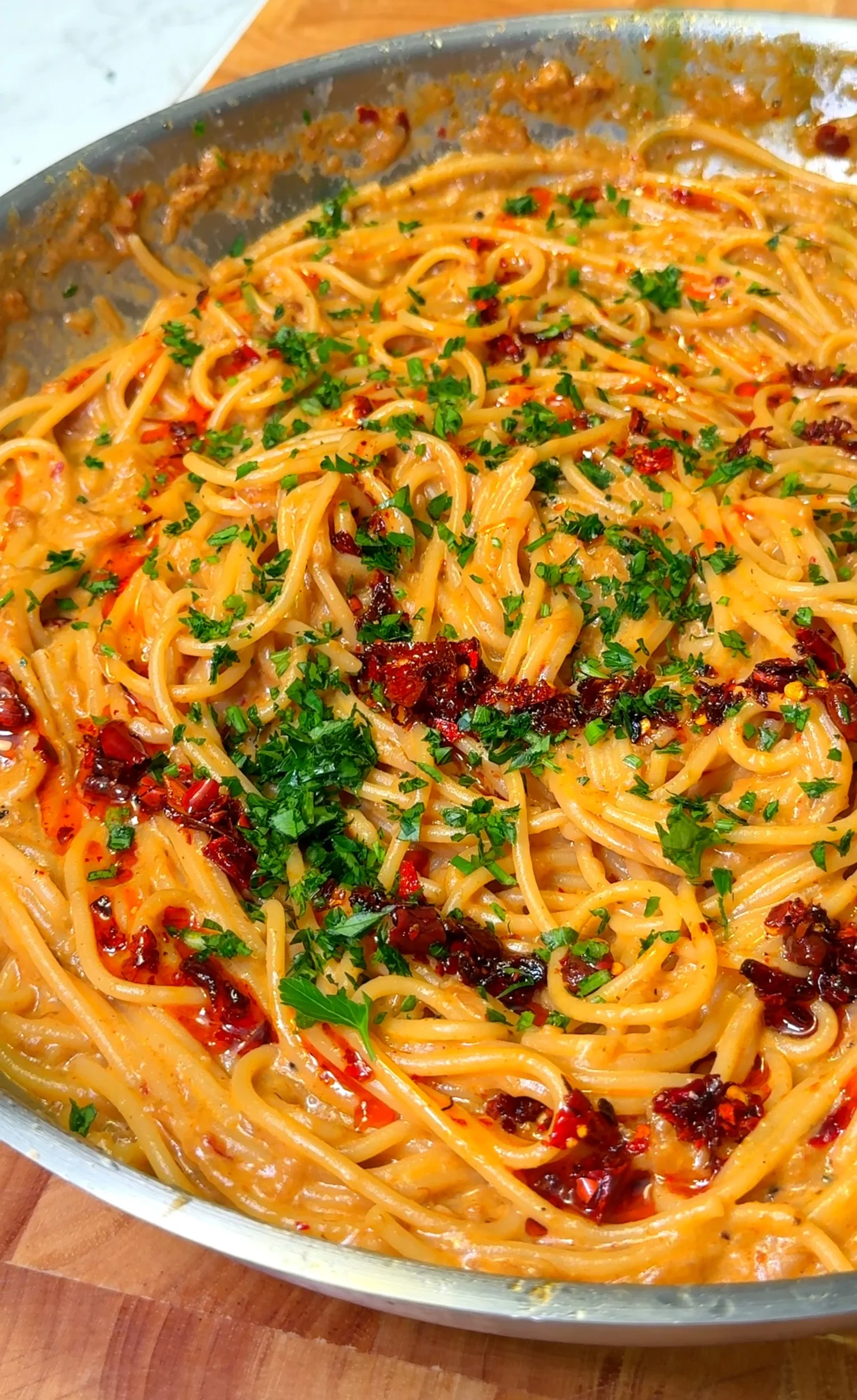 Creamy Vegan Caramelized Onion Pasta with Parmesan and Chili Oil
