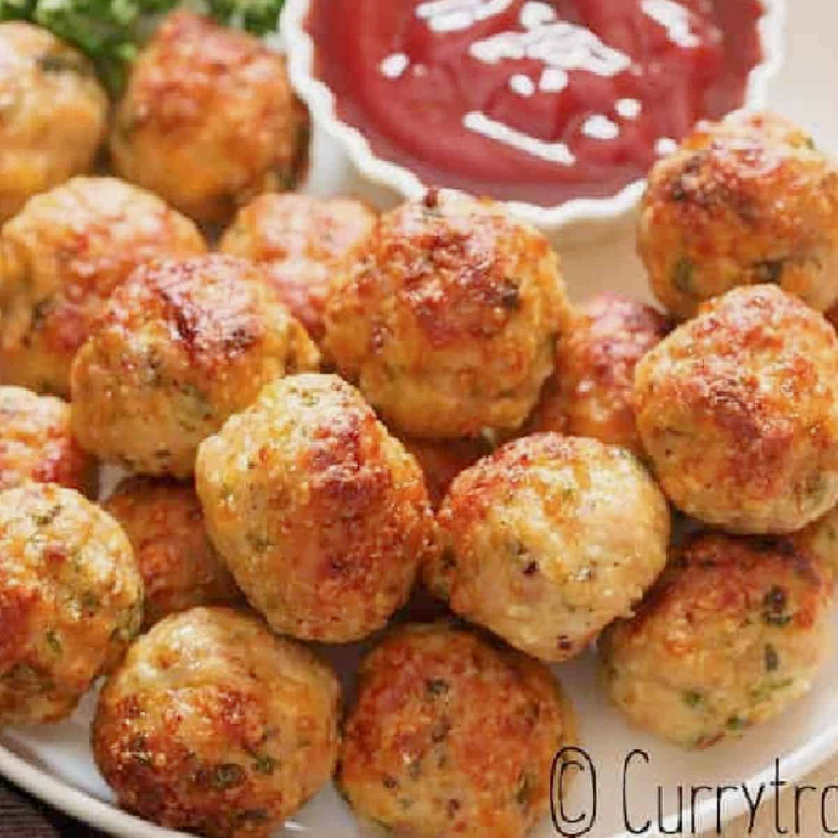 Juicy Baked Chicken Meatballs with Grated Onion and Parmesan