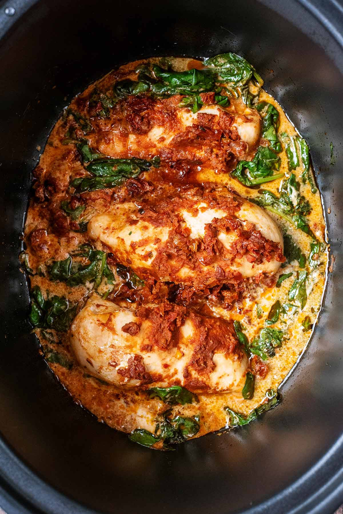 Slow Cooker Pesto Chicken with Sun-Dried Tomatoes and Creamy Parmesan