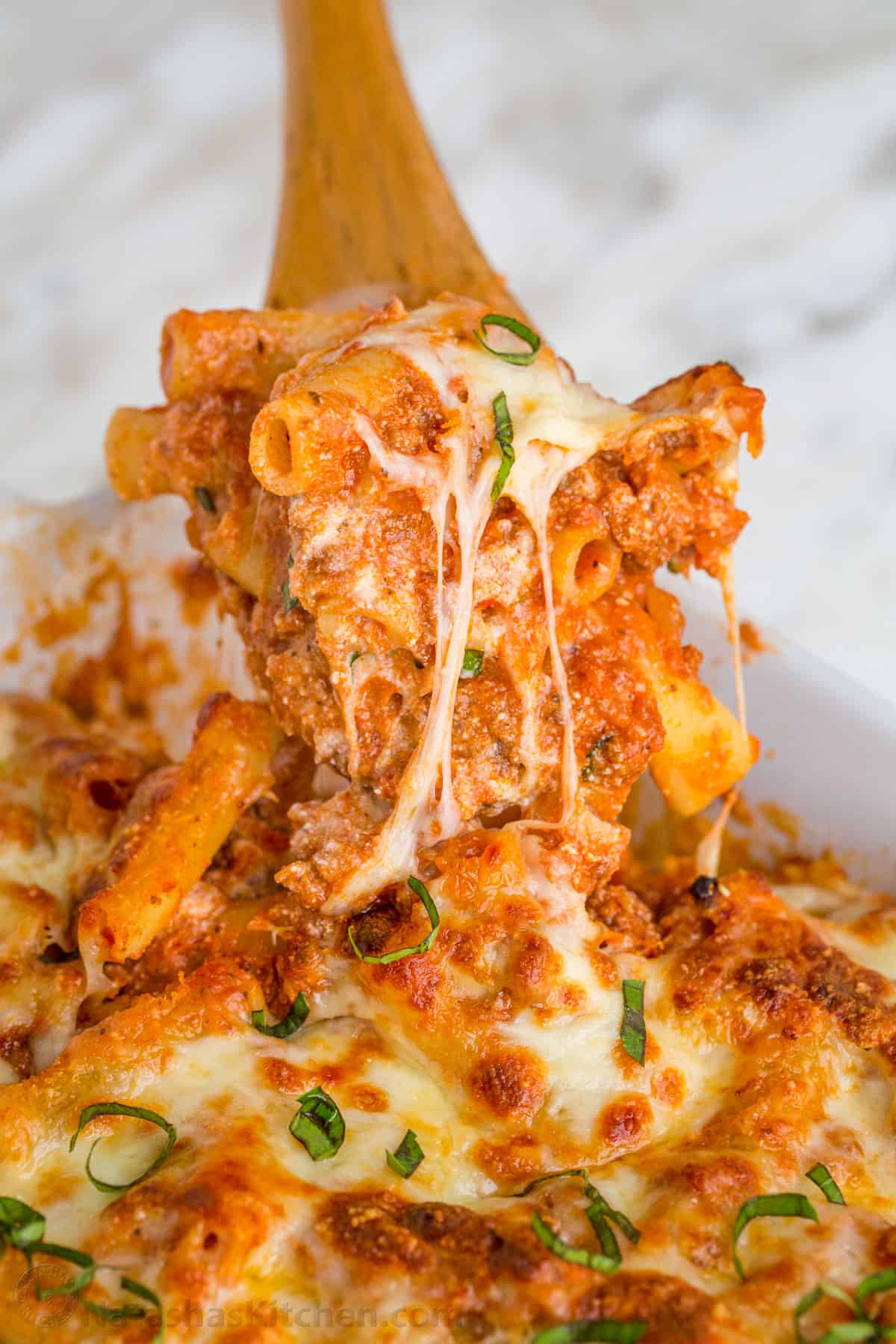 Baked Ziti with Saucy Beef, Ricotta, and Golden Cheese